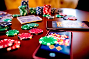 A cheerful woman in traditional clothing using her smartphone during a festive moment, showing how easily the 2G778 app fits into everyday life.